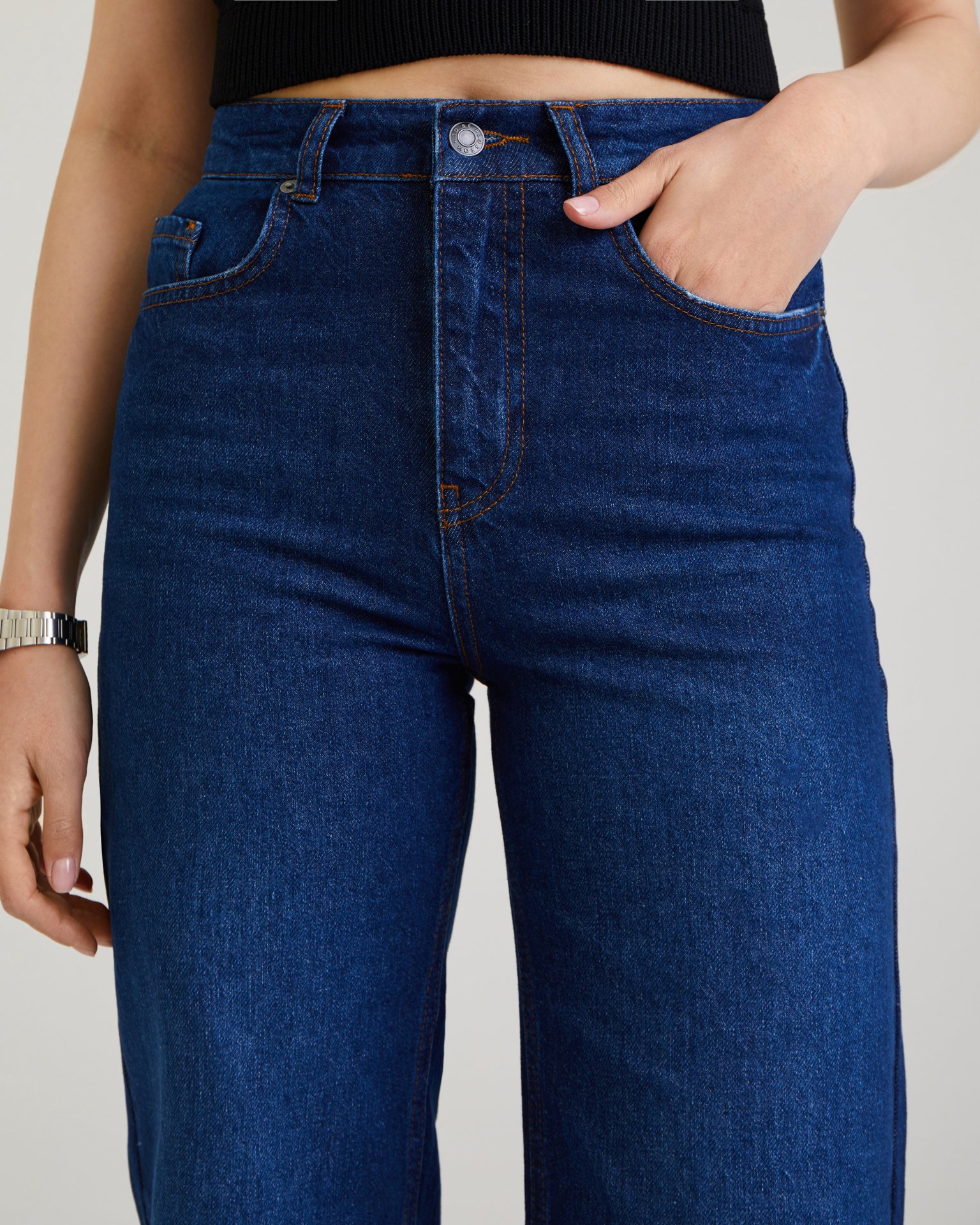 Темно-синие джинсы 8