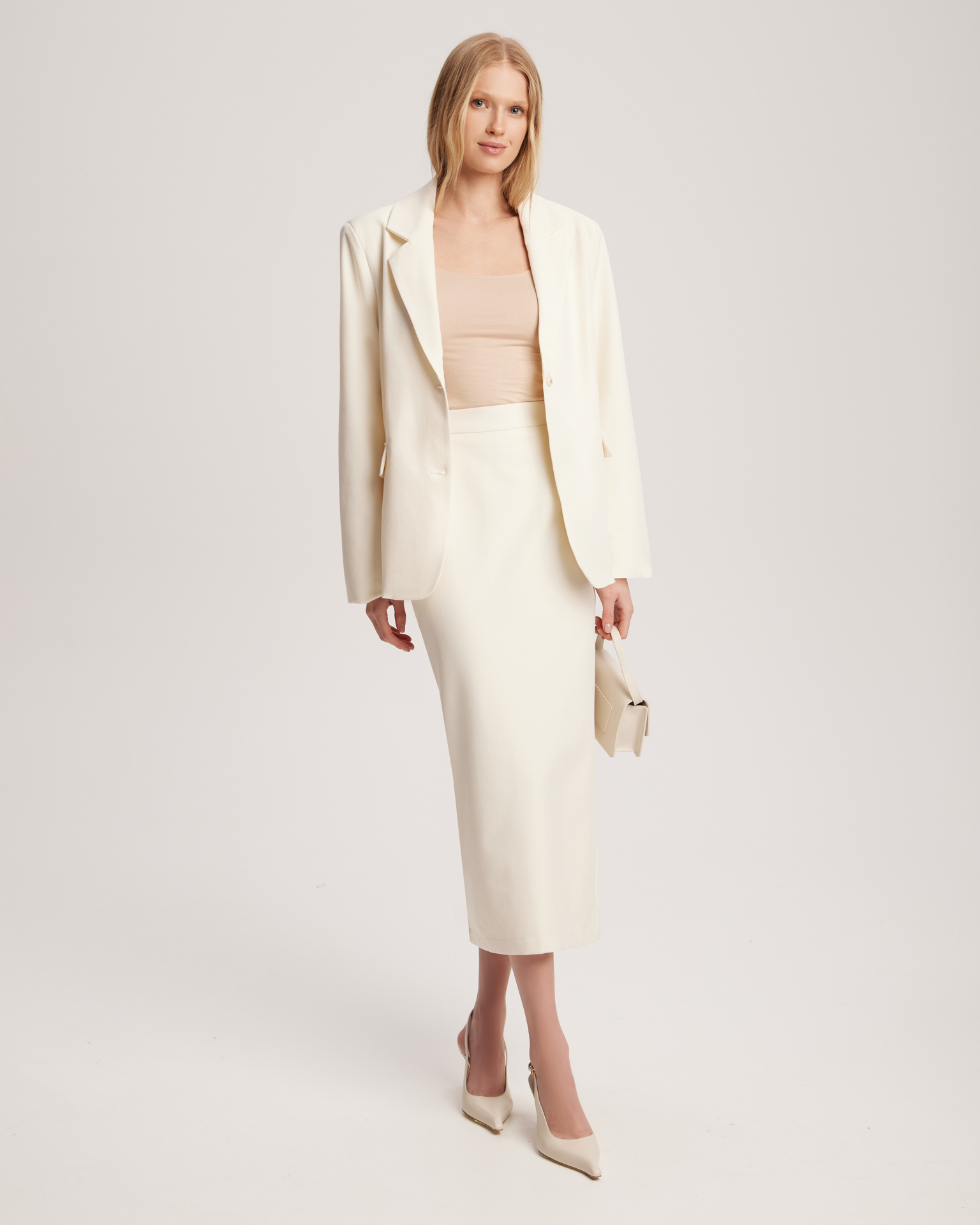 Юбка прямого силуэта в молочном цвете 1